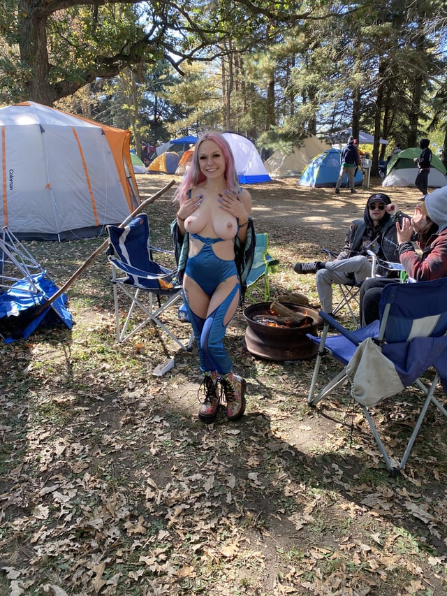 just your exhibitionist rave slut with big titties flashing you to come back to the tent with her